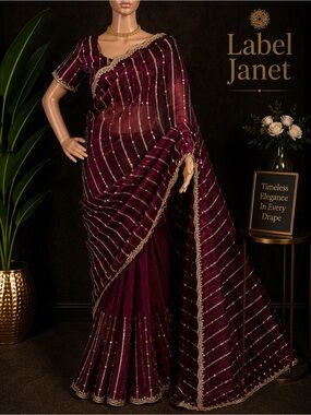 Embroidered Maroon Silk Saree with Gold Accents (Brand New)
